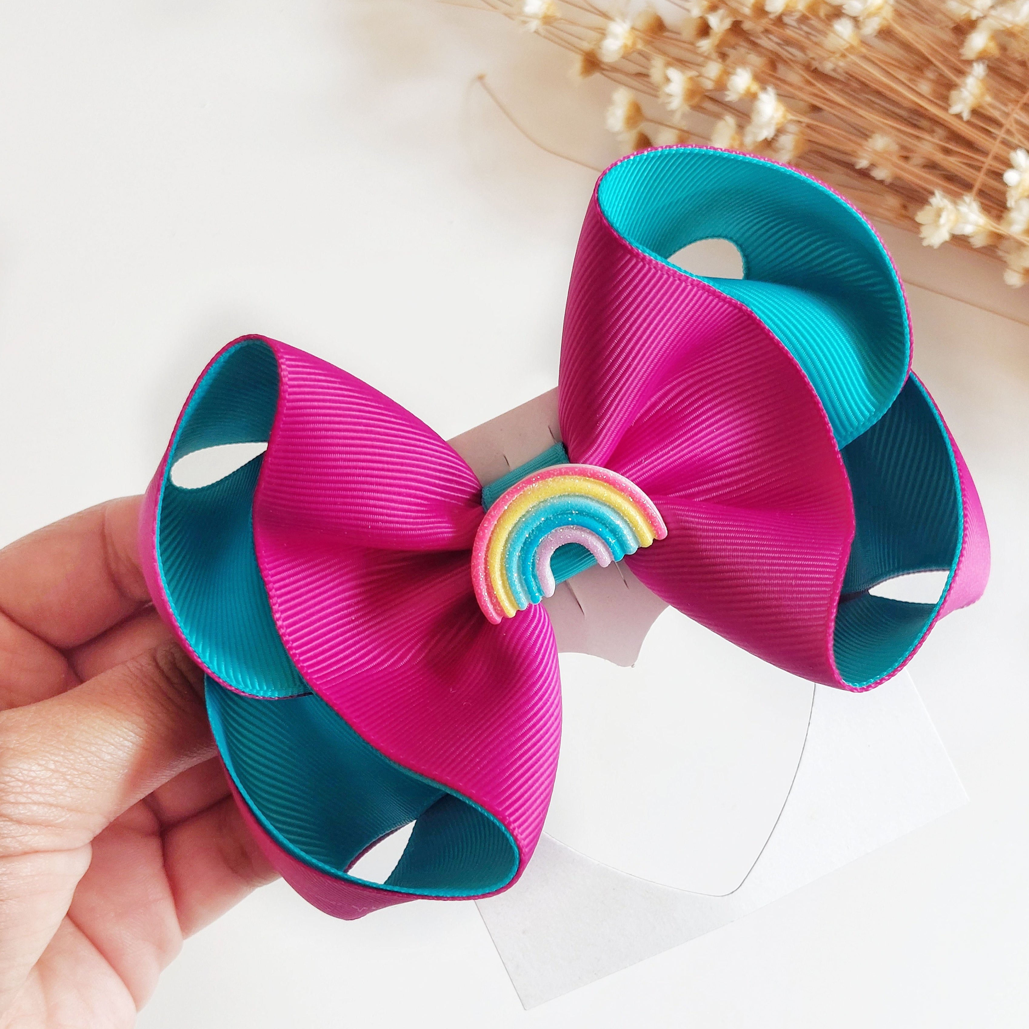 Turquoise rainbow bow
