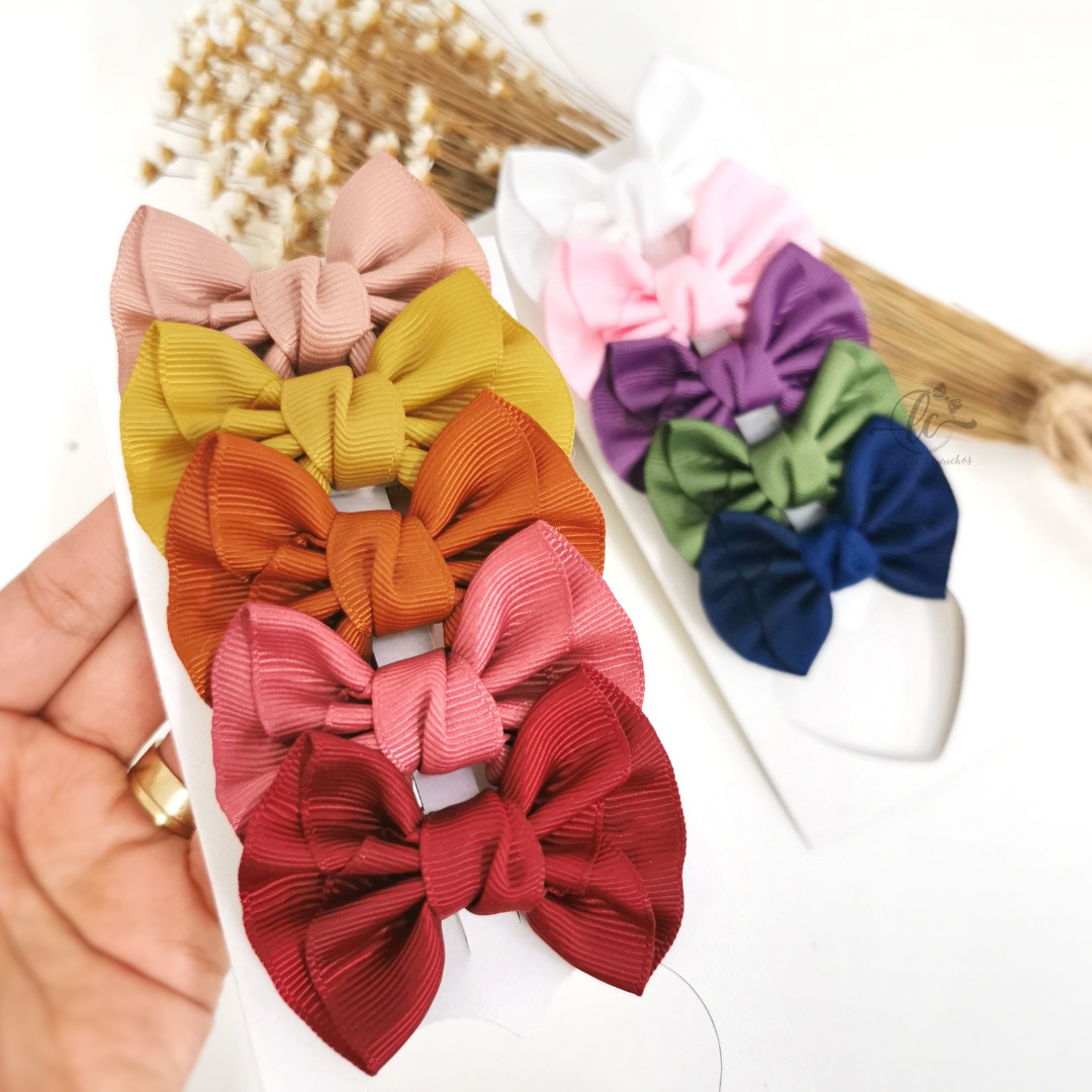 10 fiocchi arricciati Joy (R$ 3,49 ciascuno)